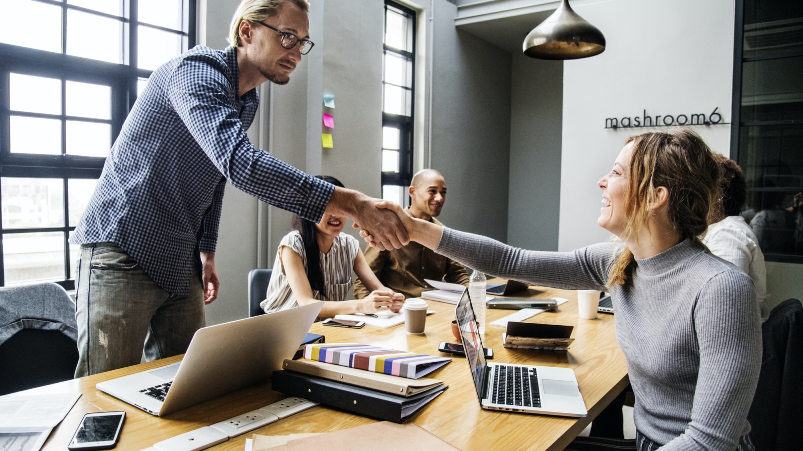 Business people shaking hands in agreement