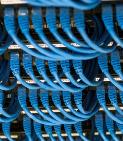 rows-of-network-cable-connected-to-router-and-swit-HG34ESU
